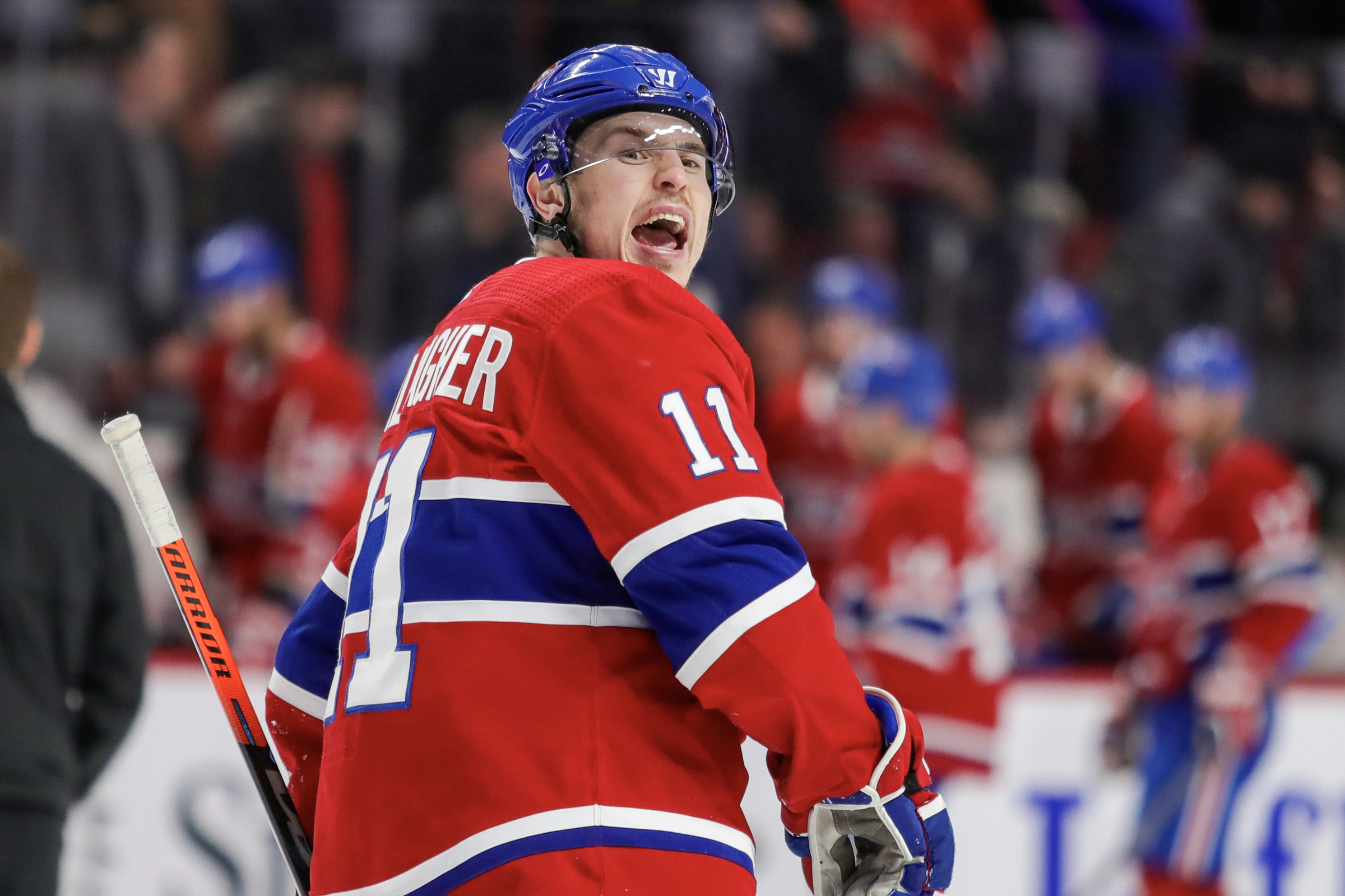 Brendan Gallagher shouts something over his shoulder.