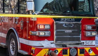 A fire truck at the five alarm fire at a two-story building at the corner of rue Notre-Dame East and rue Paul-Pau in Montreal on Thursday March 26, 2026.