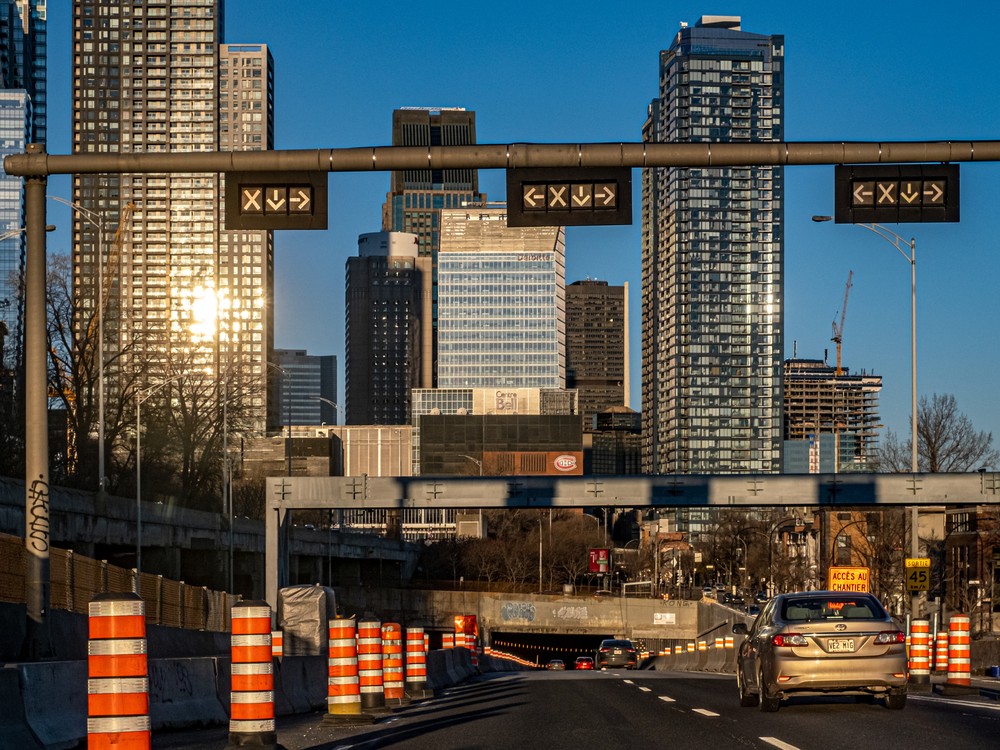 Montreal's skyline is visible above the entrance to the Ville-Marie Tunnel