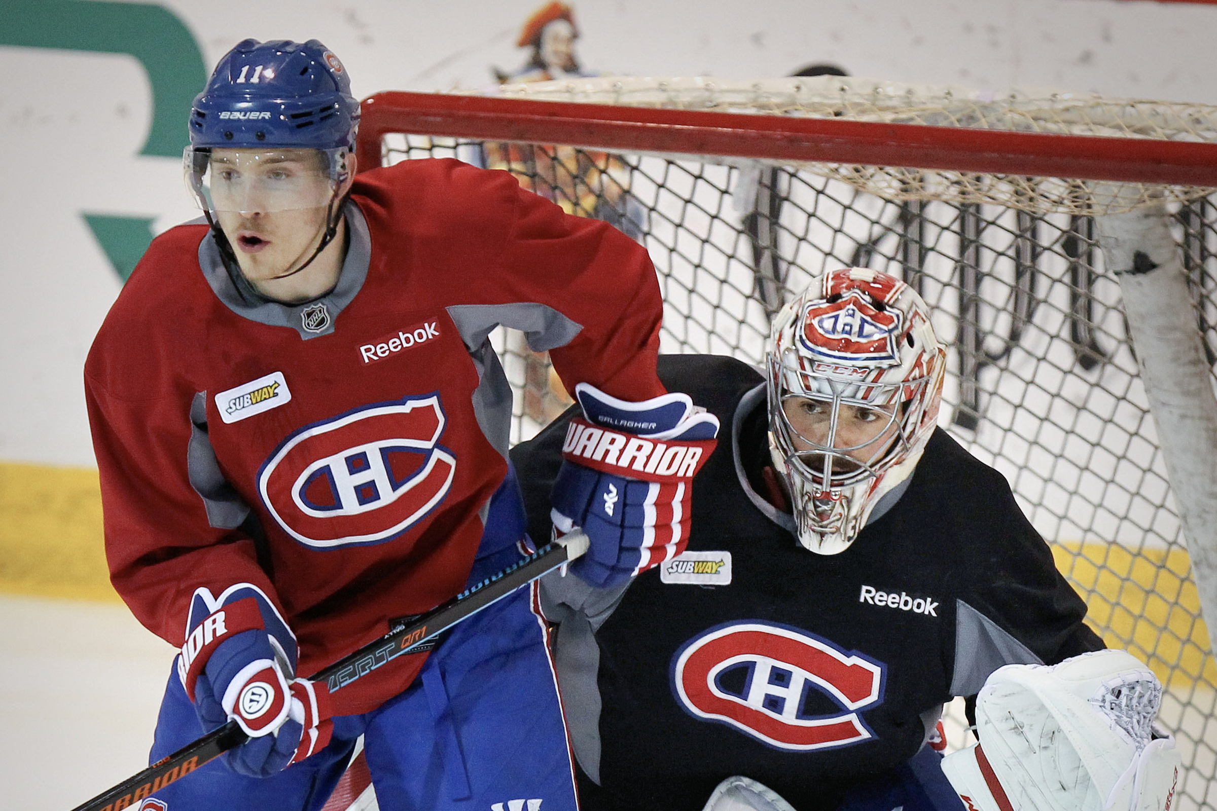 Carey Price tries to see around Brendan Gallagher during practice