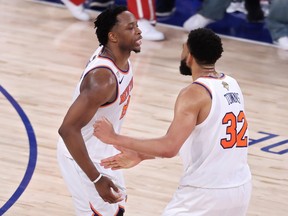 OG Anunoby of the New York Knicks celebrates with Karl-Anthony Towns after scoring the go-ahead basket against the San Antonio Spurs in the final seconds of Game 4 of the 2026 NBA Finals.