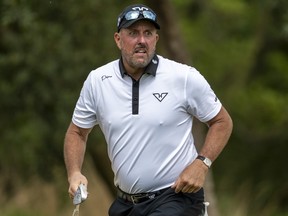 Phil Mickelson plays a bunker shot during LIV Golf South Africa.