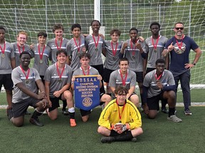 Sacre Coeur boys soccer players and staff celebrate winning the 2026 SDSSAA Second Division championship