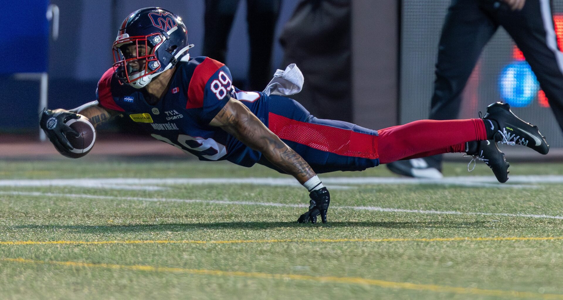 Alouettes receiver Jerreth Sterns dives for extra yards during second half against the Toronto Argonauts in Montreal on Friday.