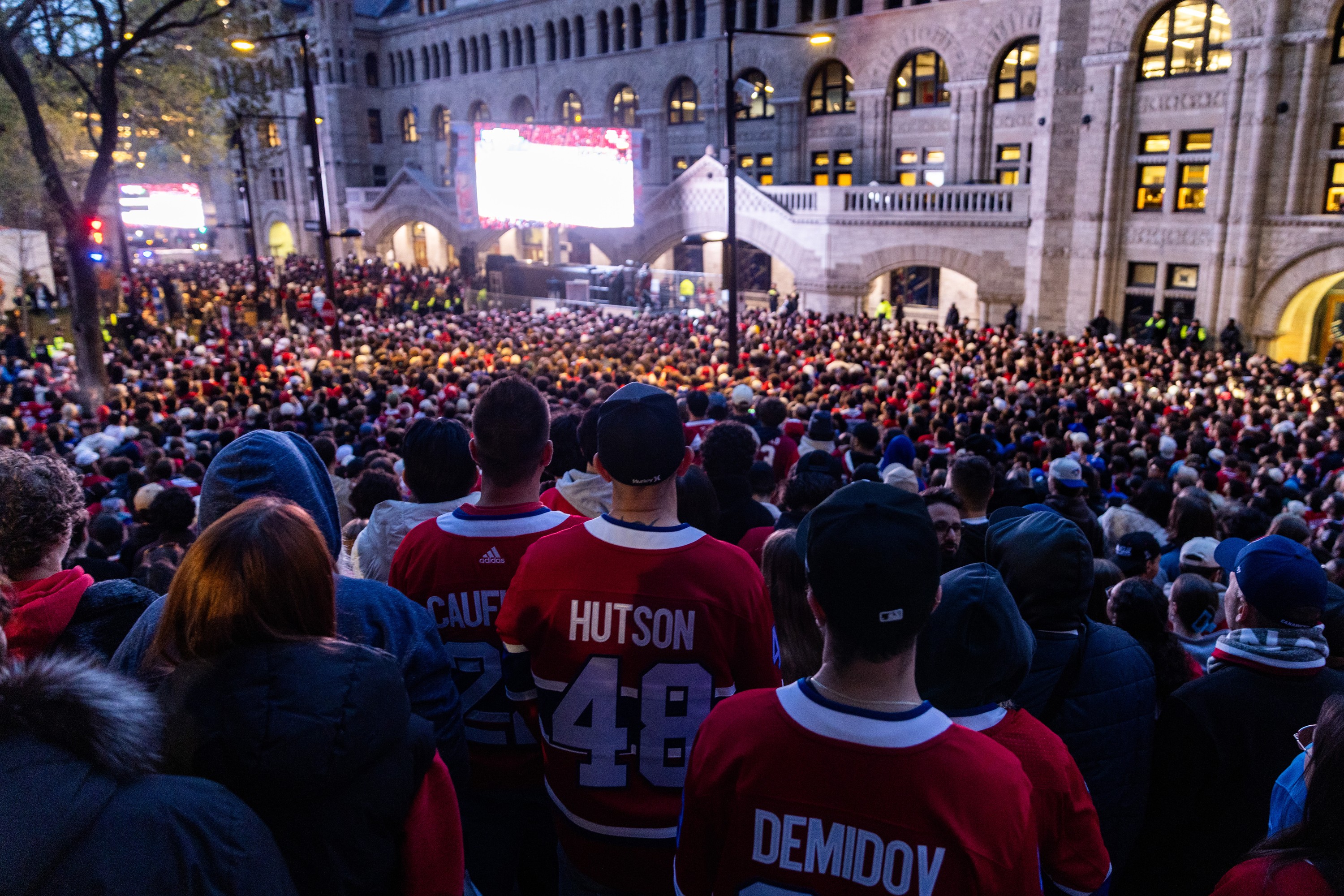 Fans watch the Canadiens battle the Buffalo Sabres in Game 4 outside the Bell Centre  in Montreal on May 12.