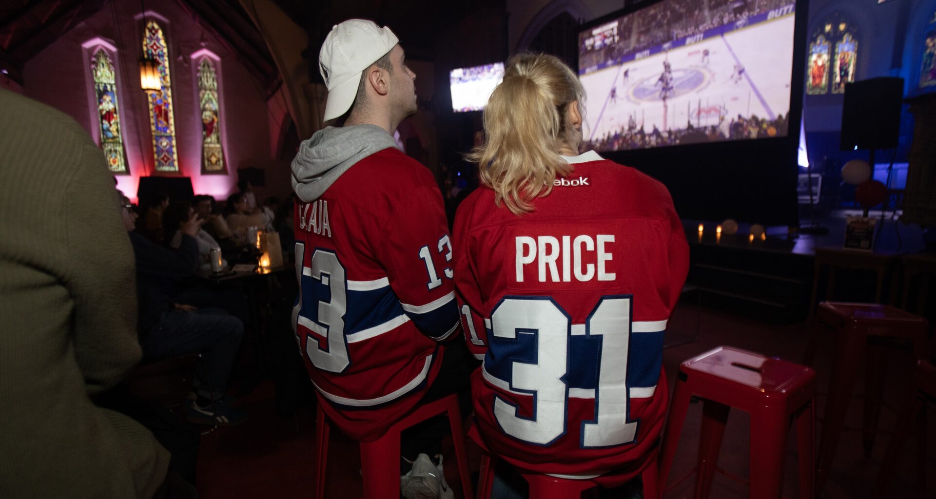 Ata Czaja and Clara Alex celebrate a first-period goal as they watched from St Jax Church during Game 5 between the Canadiens and the Buffalo Sabres on May 14.