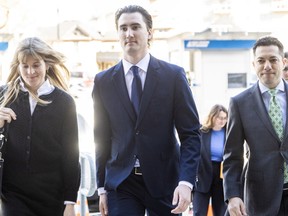 Alex Formenton arrives at the courthouse in London, Ont., for the start of his trial in 2025. Formenton was one of five members of the 2018 Canadian World Junior hockey team charged with sexual assault and later acquitted.