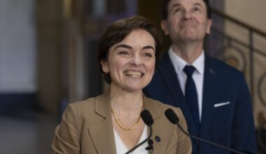 Quebec Premier Christine Fréchette smiles from a lectern