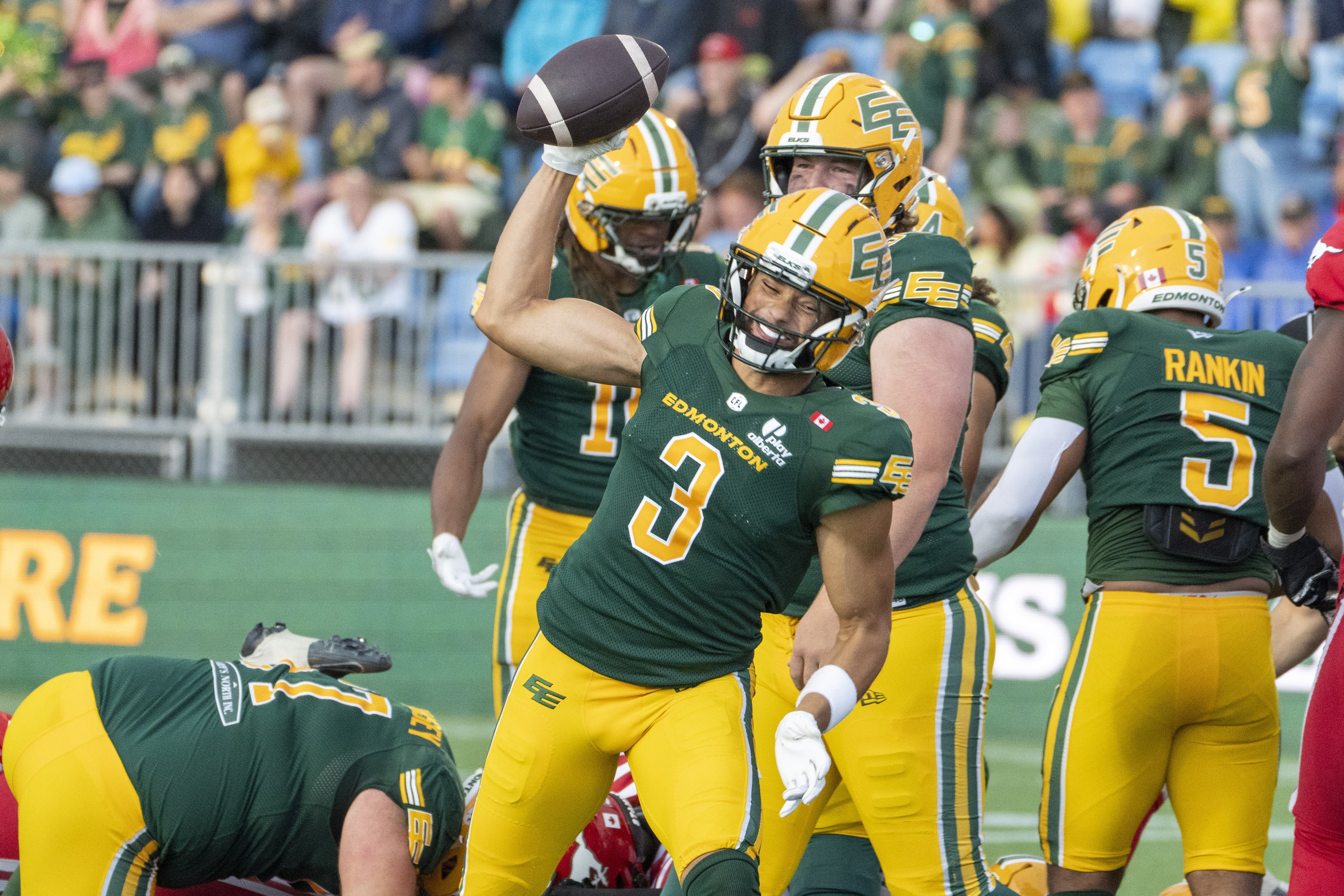 Elks receiver Austin Mack celebrates his touchdown during pre-season game against the Calgary Stampeders in Edmonton on May 29.