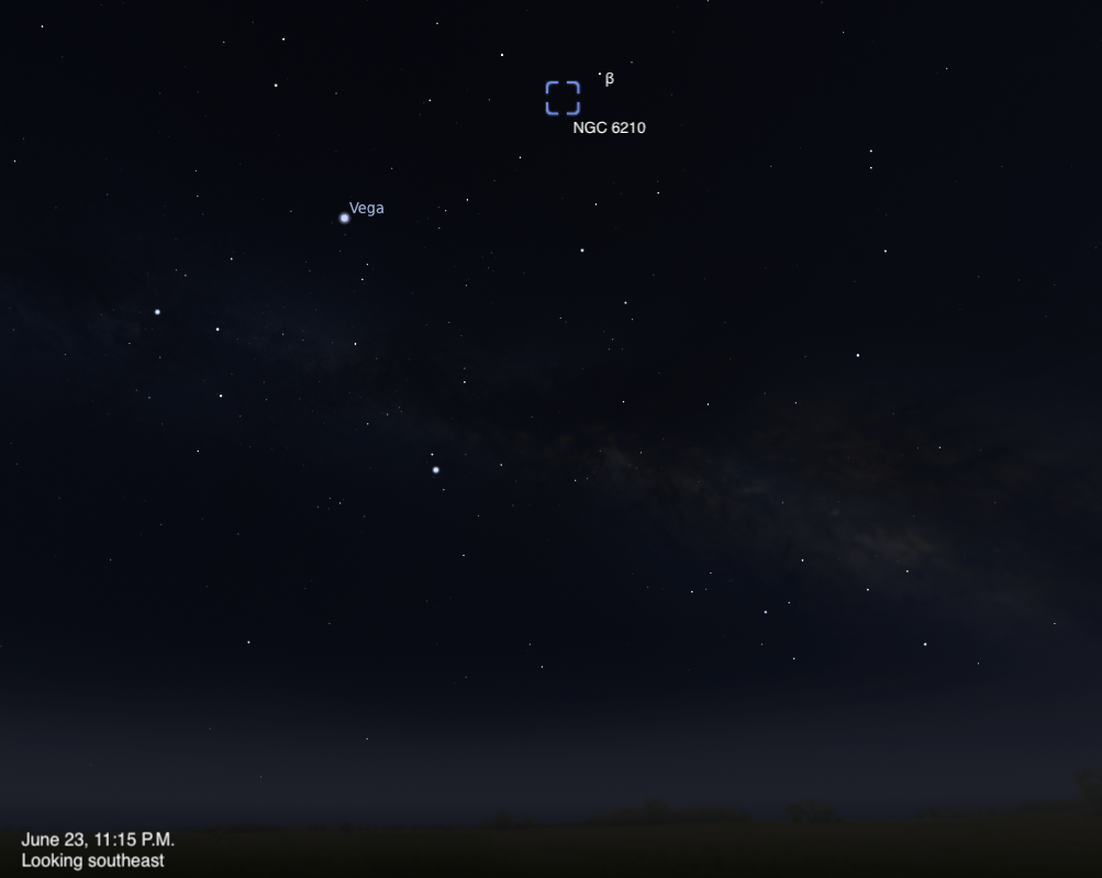 Planetarium simulation showing the southeastern sky on June 23, 2026, at 11:15 PM. Vega is visible at center-left, and NGC 6210 (a planetary nebula) is marked with a dashed blue box near the top center, close to a star labeled β.