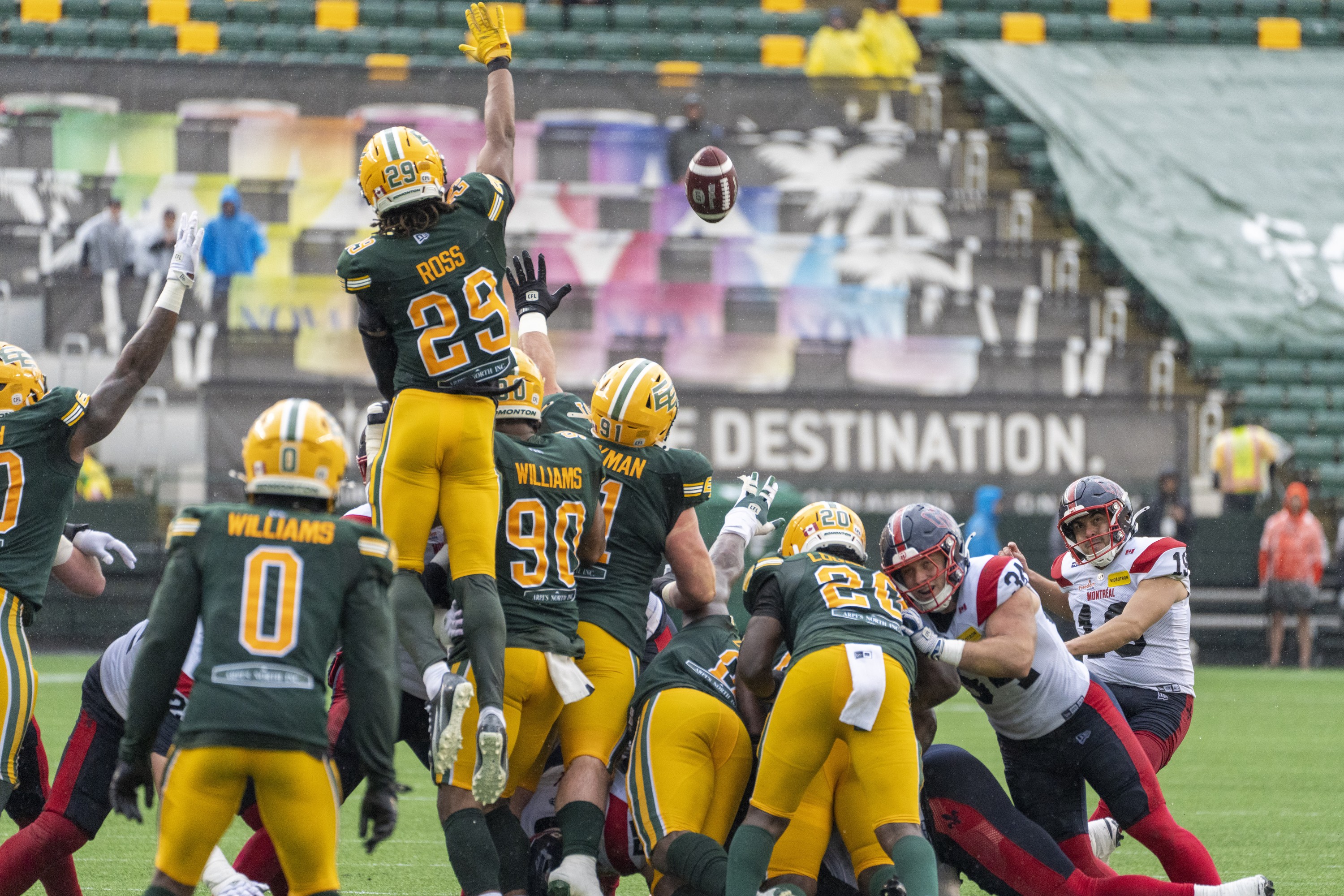 Elks try to block a field goal attempt by Alouettes' Jose Maltos-Diaz on June 20 in Edmonton.