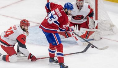 Canadiens defenceman Noah Dobson attempts to deflect a shot in front of Carolina Hurricanes goalie Frederik Andersen and Jaccob Slavin during Game 4 of Eastern Conference Final in Montreal on May 27.