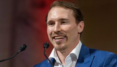 Brendan Gallagher speaks at a podium