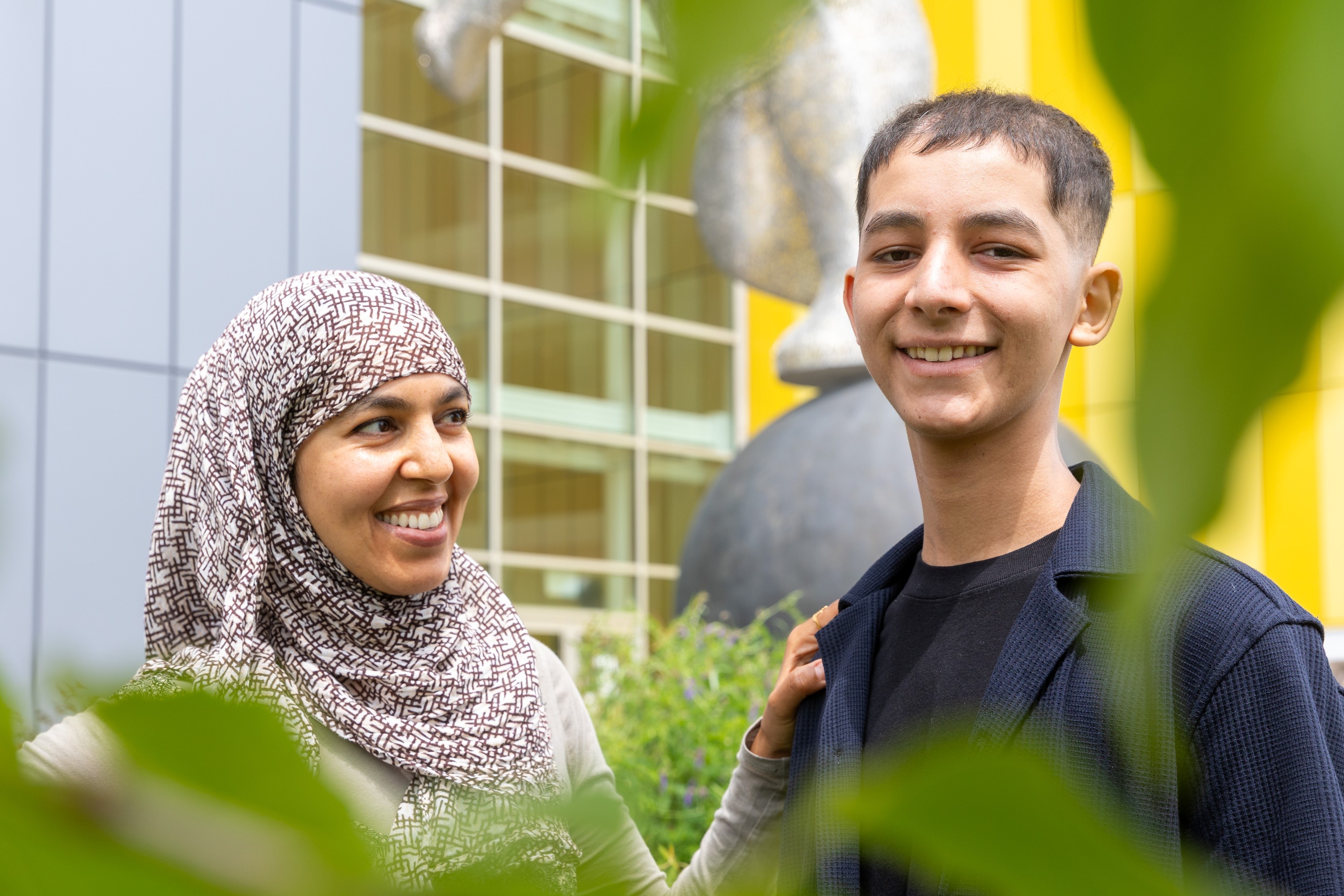 Adam Beaury poses for a portrait with his mother, Asmaa Haïda, at the Montreal Children's Hospital.  