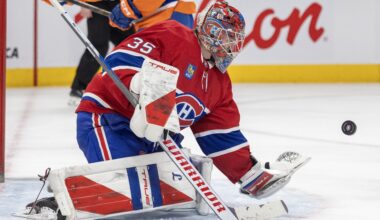 Canadiens' Samuel Montembeault makes a glove save against the New York Islanders during second period in Montreal on Feb. 26, 2026.