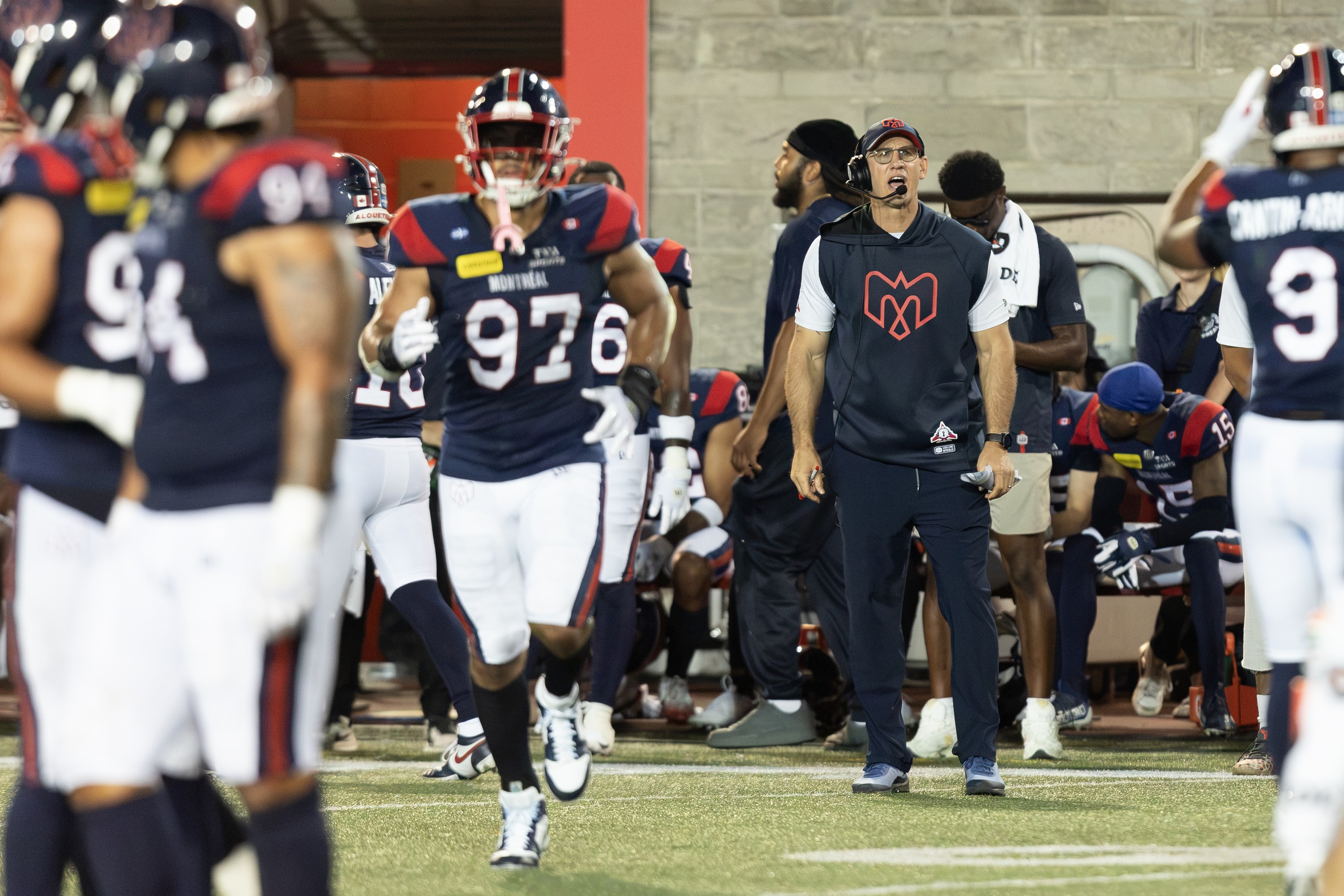 Alouettes coach Jason Maas yelling from the sidelines. 