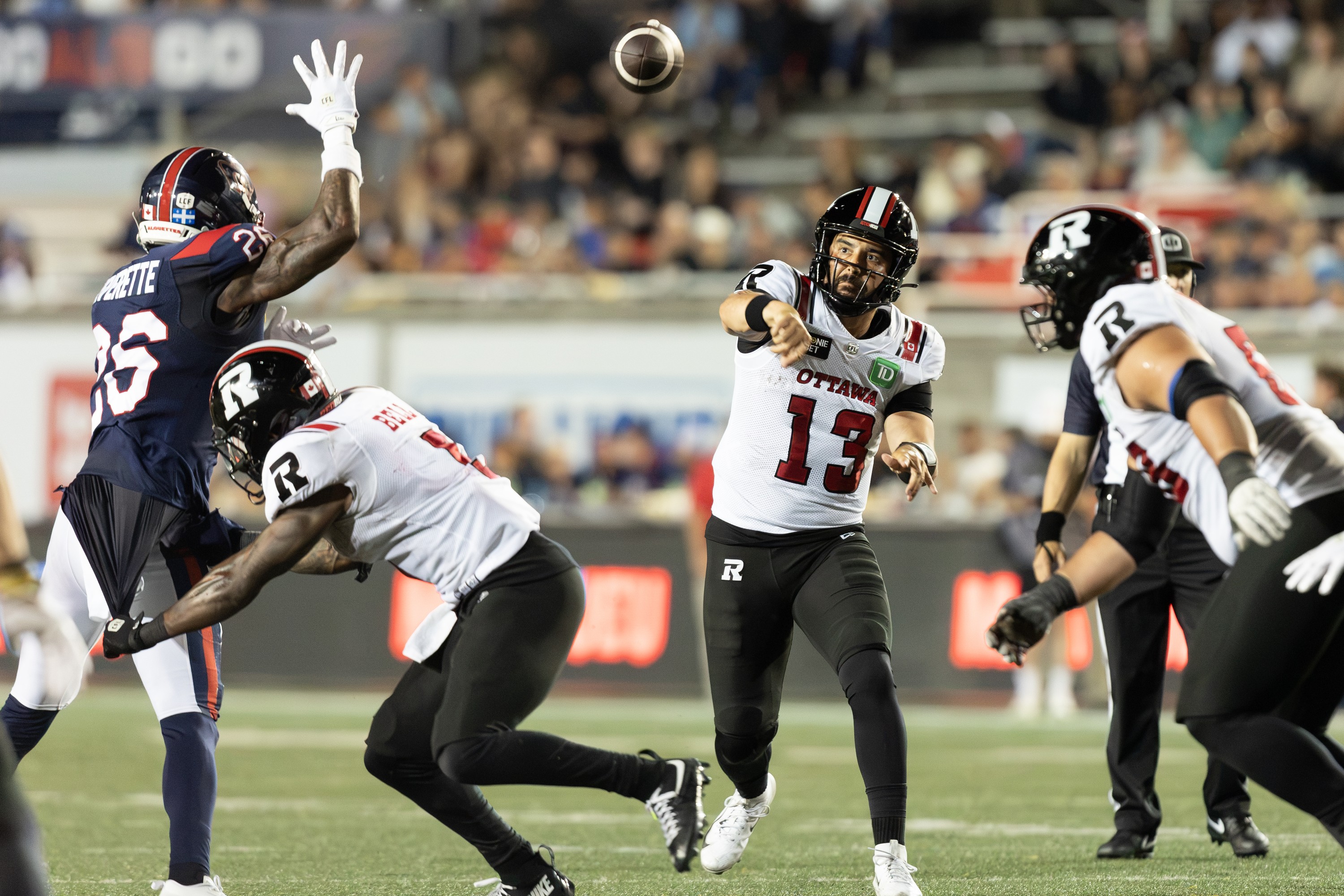 Ottawa quarterback Jake Maier throws the ball 