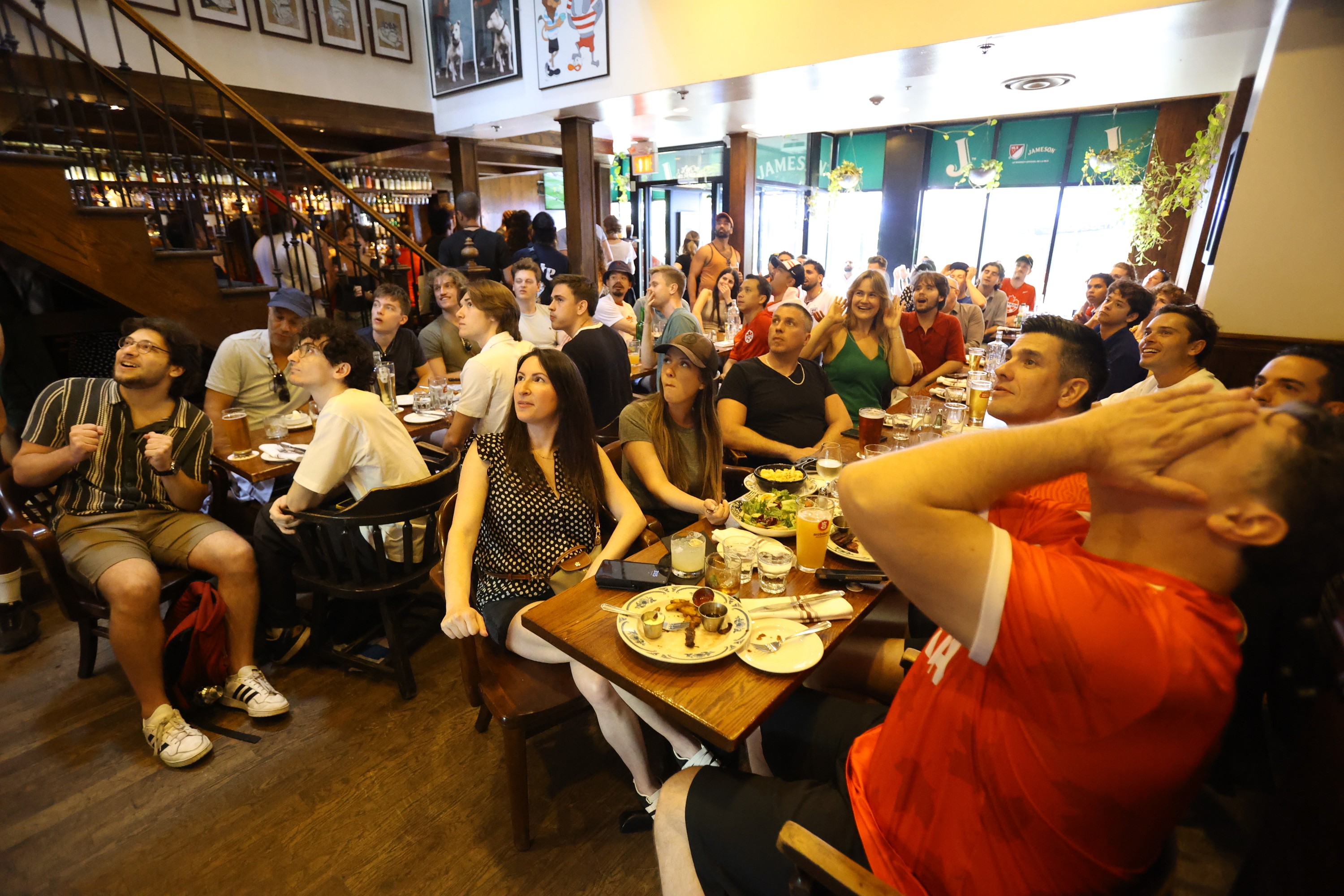 Soccer fans at teh Burgundy Lion pub were frustrated after a near miss for Canada during Sunday's game against South Africa at the World Cup.