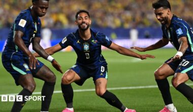 Matheus Cunha celebrates with his Brazil team-mate