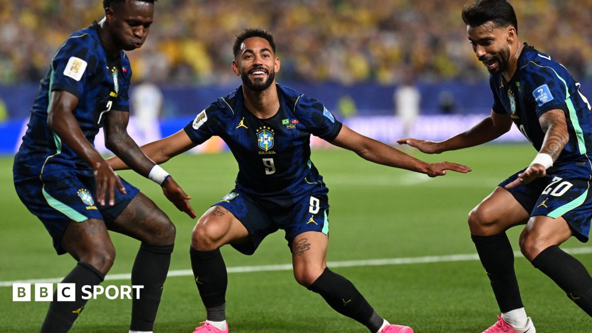 Matheus Cunha celebrates with his Brazil team-mate
