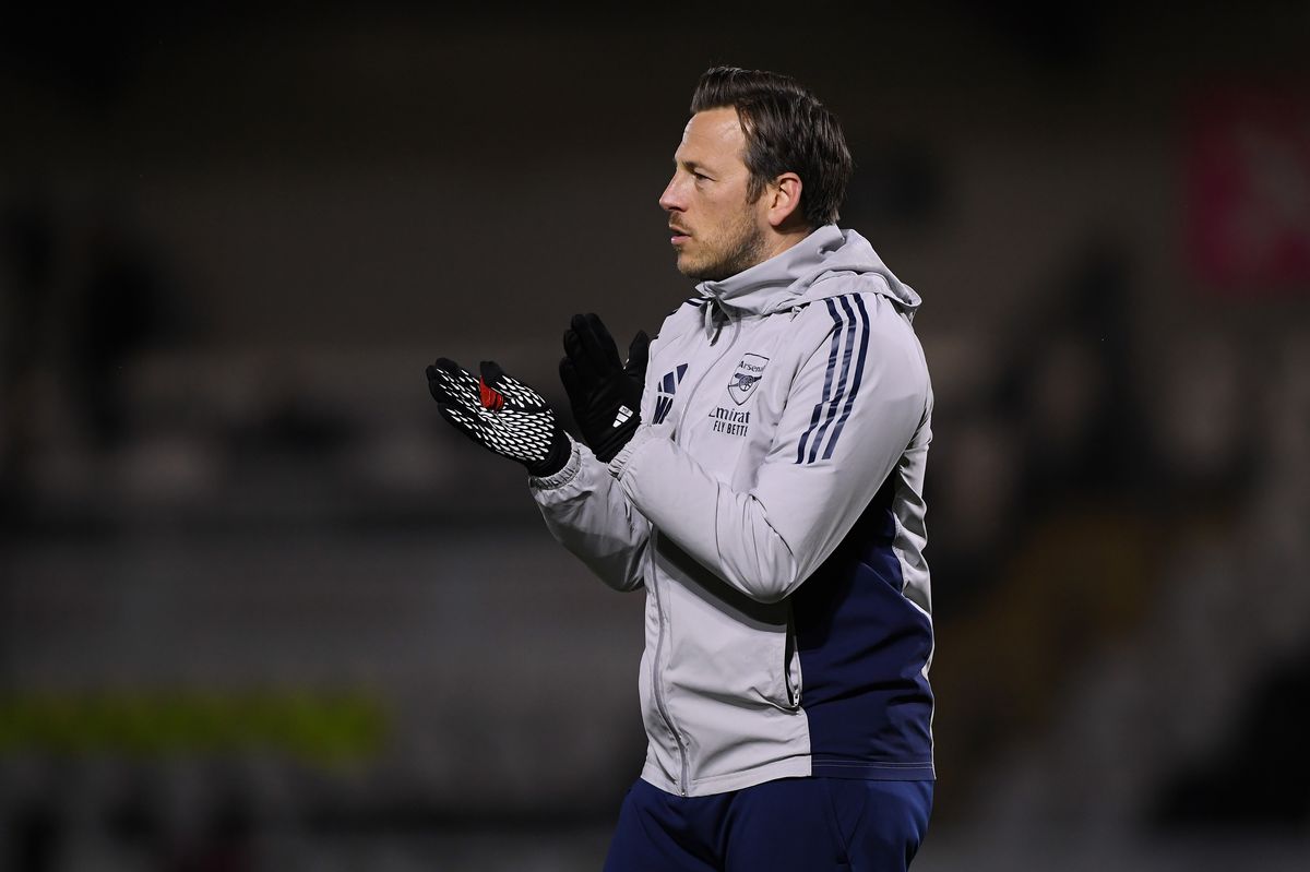 Max Porter, Head Coach of Arsenal U21 applauds during the warm up prior to the Premier League 2 match between Arsenal U21 and Newcastle United U21 at Meadow Park on February 13, 2026 in Borehamwood, England