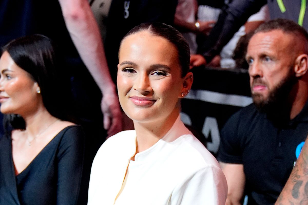 Molly-Mae in a white dress at Tommy Furys boxing fight