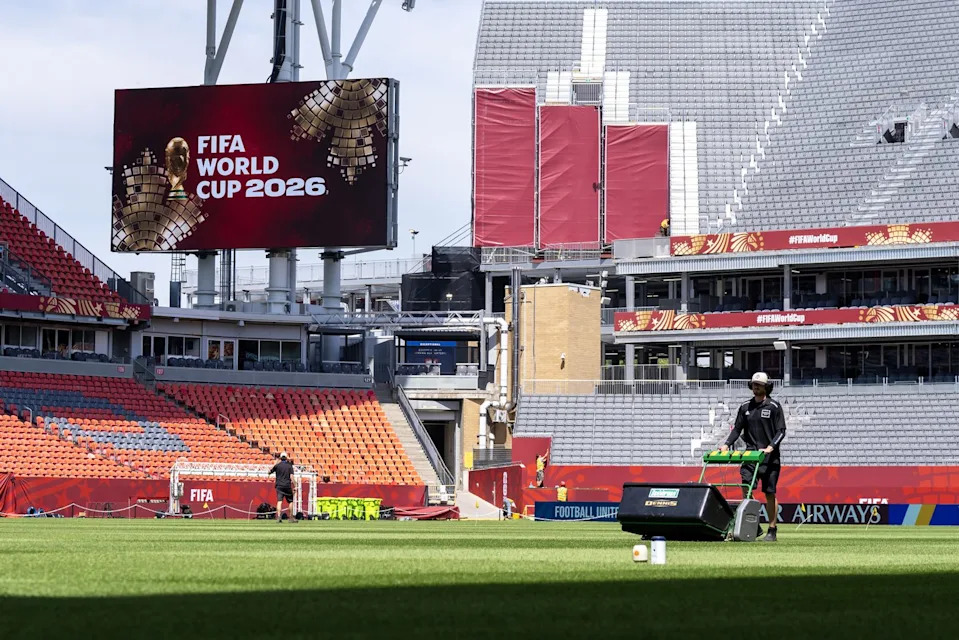 A worker mows the grass at Toronto Stadium in preparation for FIFA World Cup 2026 in Toronto on June 4, 2026. THE CANADIAN PRESS/Frank Gunn - The Canadian Press