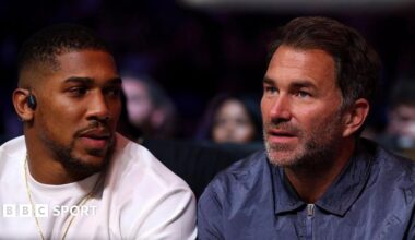 Eddie Hearn and Anthony Joshua in conversation at ringside