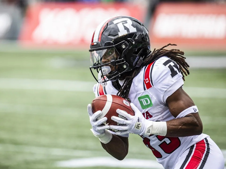 The Redblacks’ Kalil Pimpleton runs with the ball on a kick return during the first half of the game.