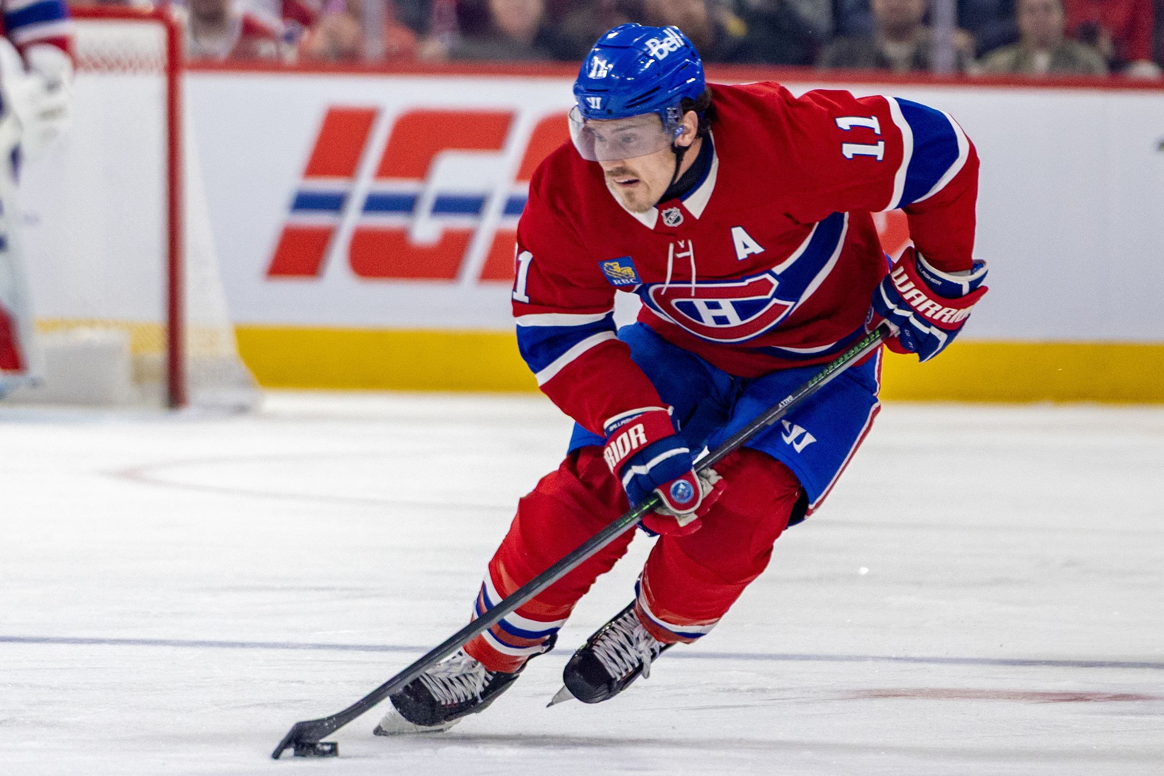 Brendan Gallagher skates with the puck during a game.