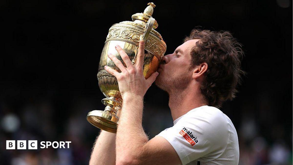 Andy Murray holding the Wimbledon trophy