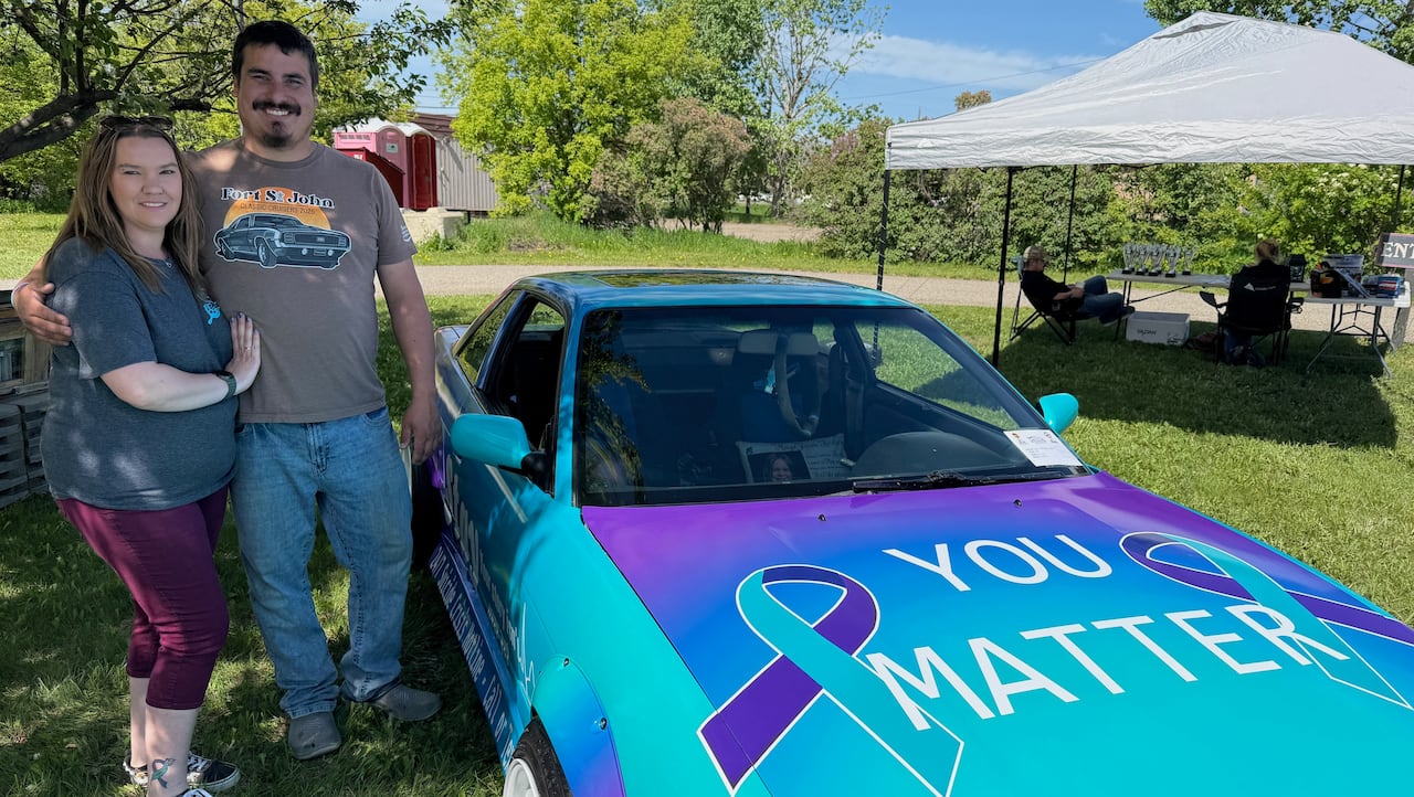 Fort St. John, B.C. couple Brianne and Justin Lagassé at the Taylor Car Show on May 30, 2026. They say the car was well-supported by the community.
