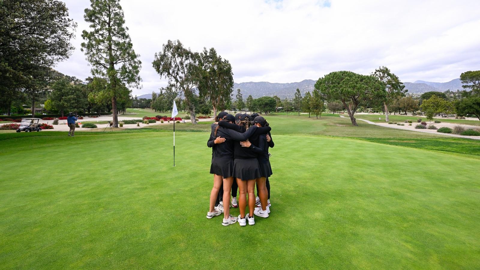 The USC women's golf team poses together with the runner-up trophies after the 2026 NCAA Championships
