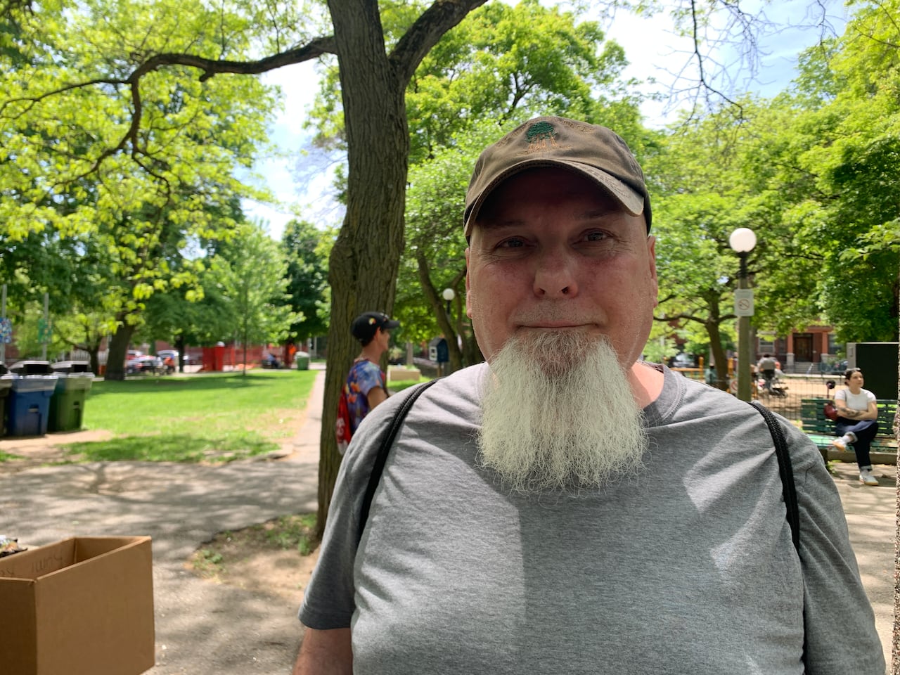 a man in a grey shirt