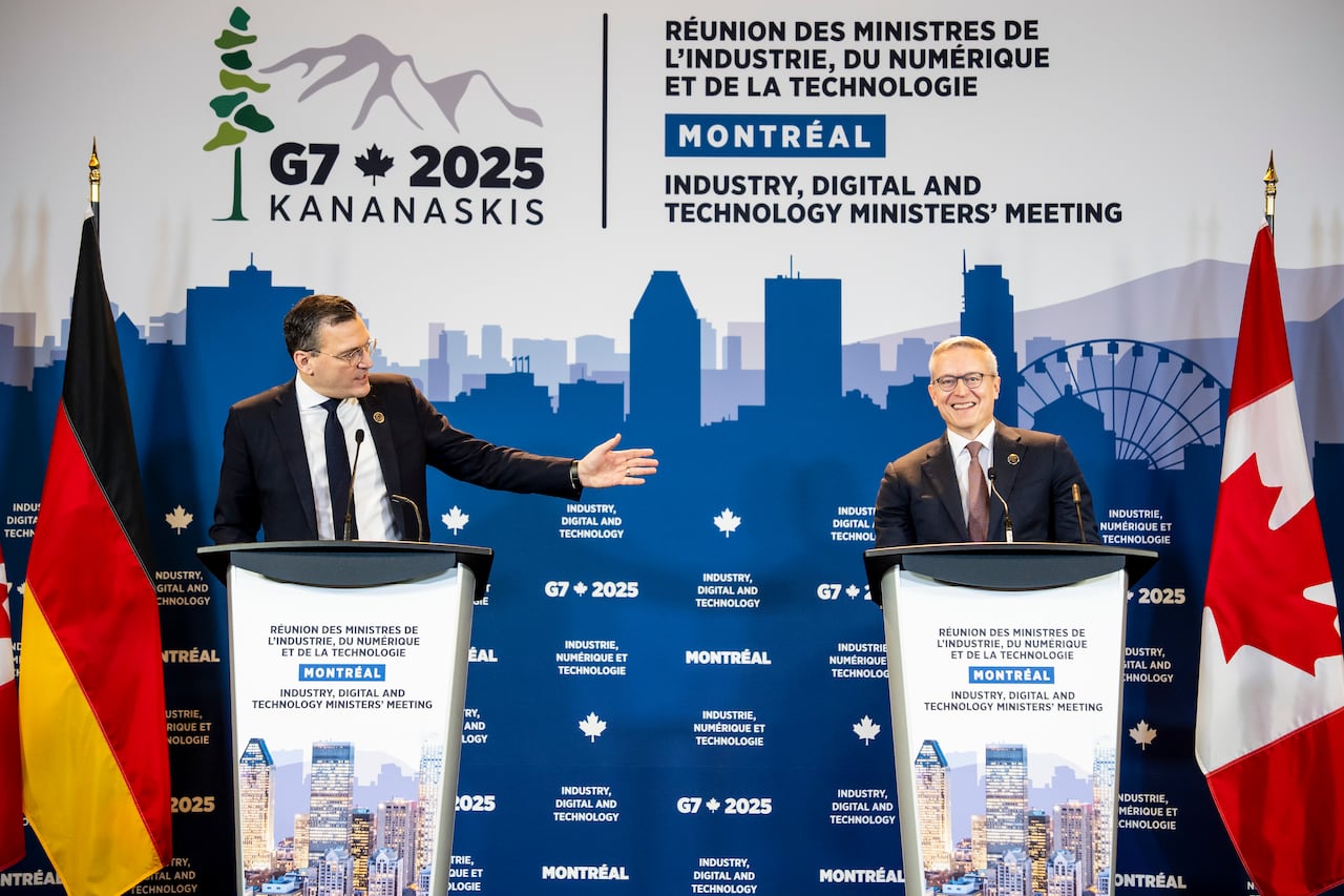 Canada's Minister of Artificial Intelligence and Digital Innovation Evan Solomon, left, and Germany's Minister for Digital Transformation and Government Modernization Karsten Wildberger