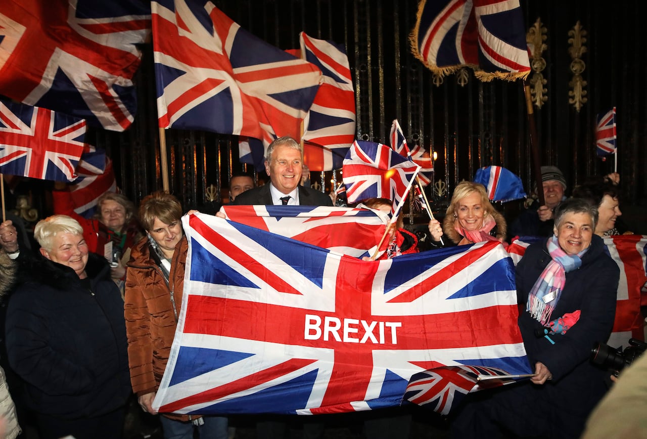 People wave a flag.