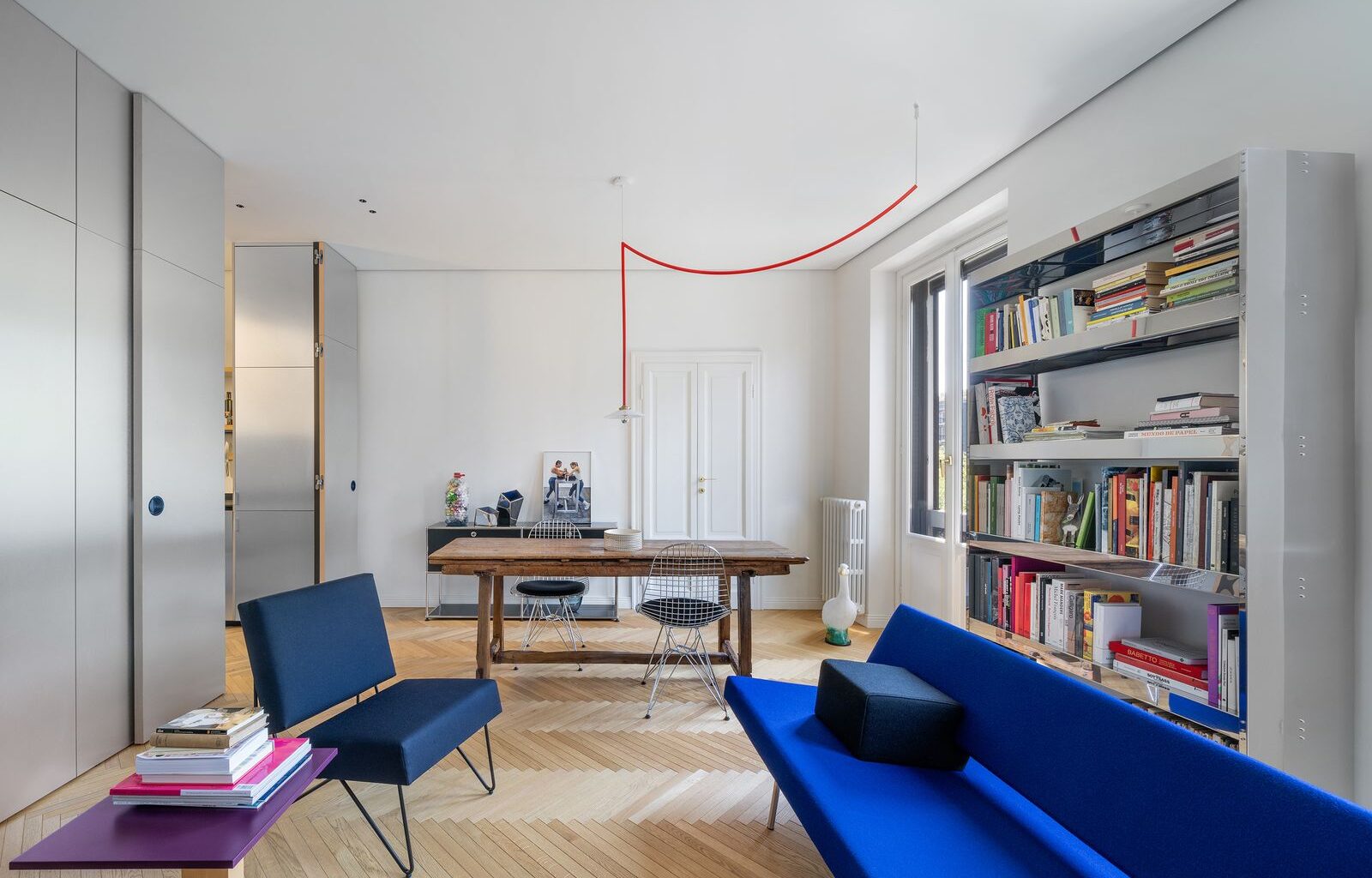 You Enter This Historic 860-Square-Foot Milan Apartment Through a New Metal Portal