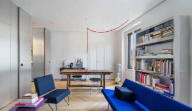 You Enter This Historic 860-Square-Foot Milan Apartment Through a New Metal Portal