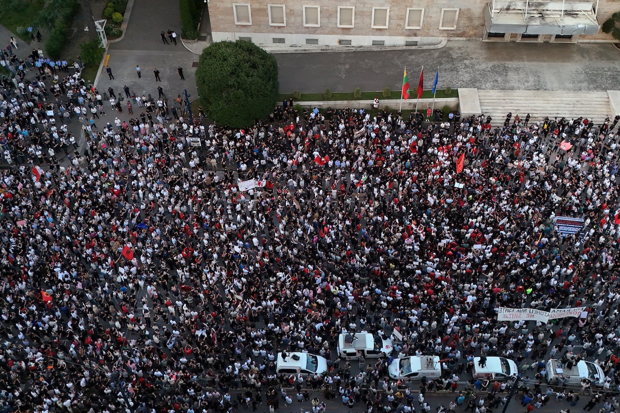 A drone-captured view of a large crowd of protesters in Tirana, Albania, who oppose a luxury resort development project linked to Jared Kushner, the son-in-law of U.S. President Donald Trump.