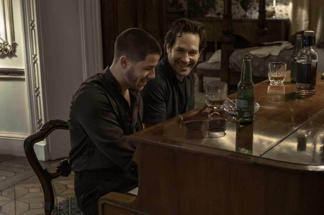 Nick Jonas as Danny Wilson and Paul Rudd as Rick Power in Power Ballad.