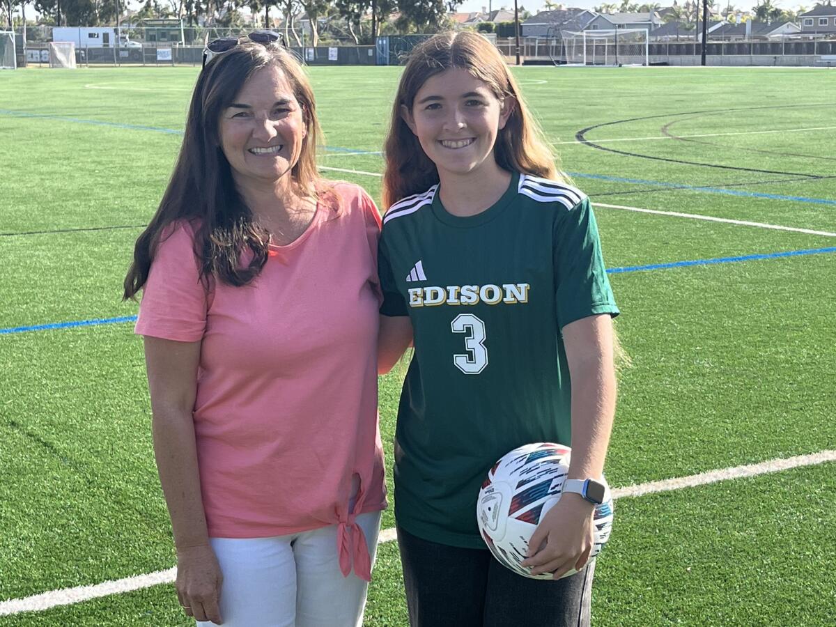 Edison High School teacher Kristie Sullivan, left, and her sophomore daughter Ashley.