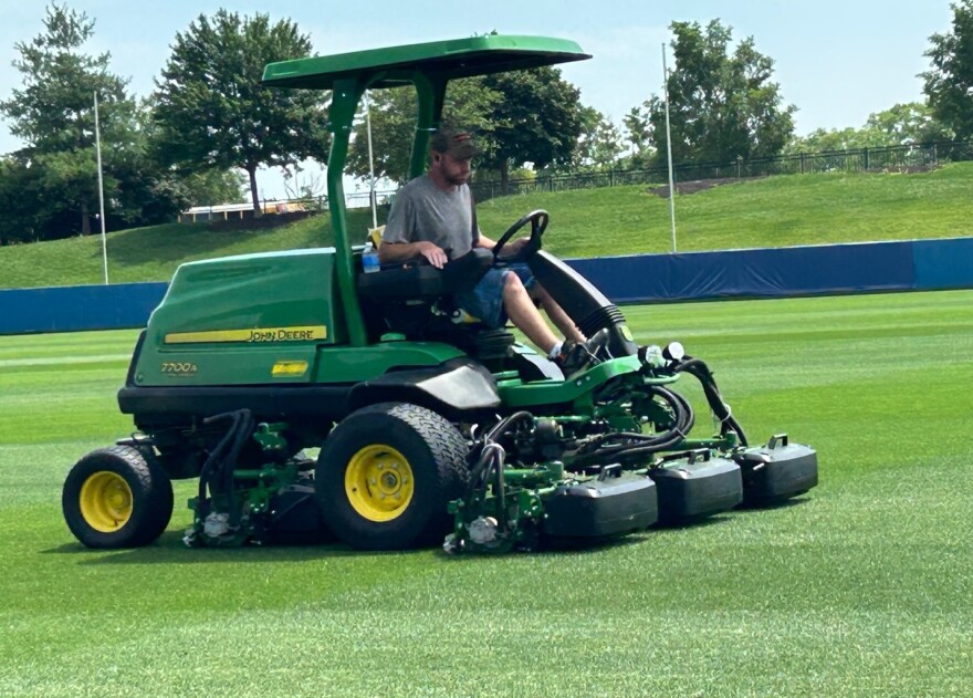 With two John Deere PrecisionCut mowers operating at the same time, it takes two hours to mow the Rock Chalk pitch. Kody Roberts cuts more than an 8-foot-wide swath with each pass of the mower.