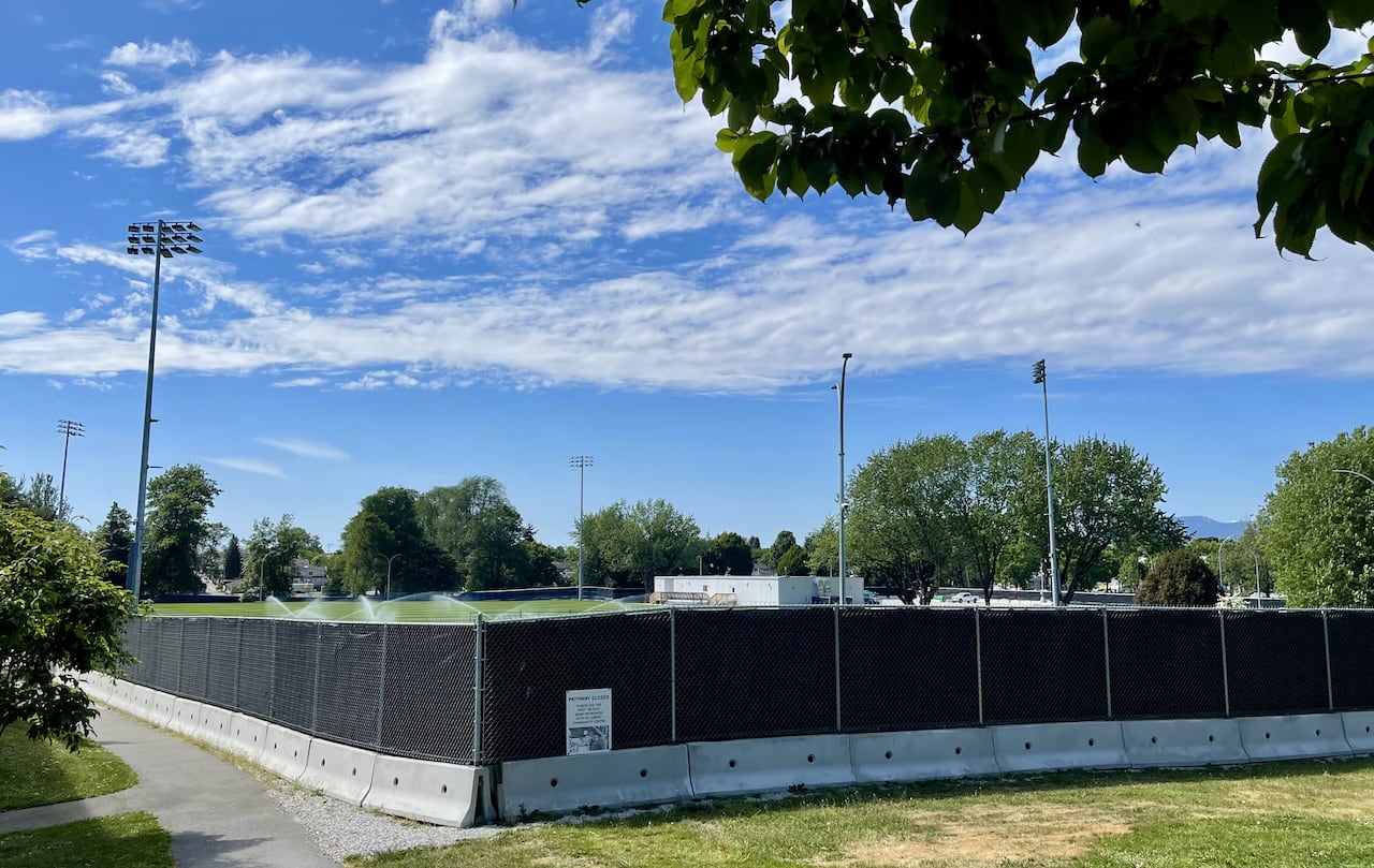 A high blacked-out fence encircles the FIFA World Cup training venue at Killarney Park in East Vancouver.