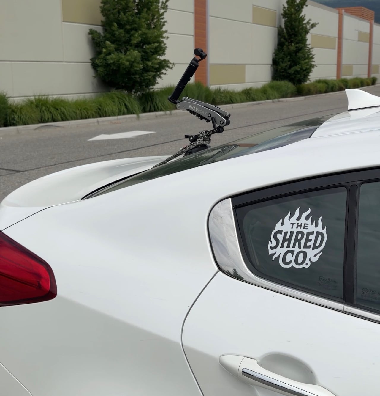a mount on the back of a white car