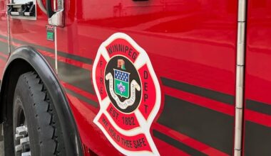 Resident, firefighter taken to hospital after rooming house blaze in Winnipeg's North End