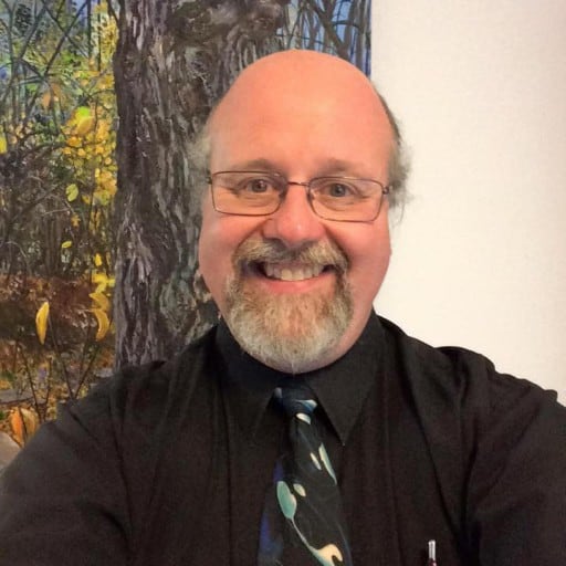 man in black shirt and tie