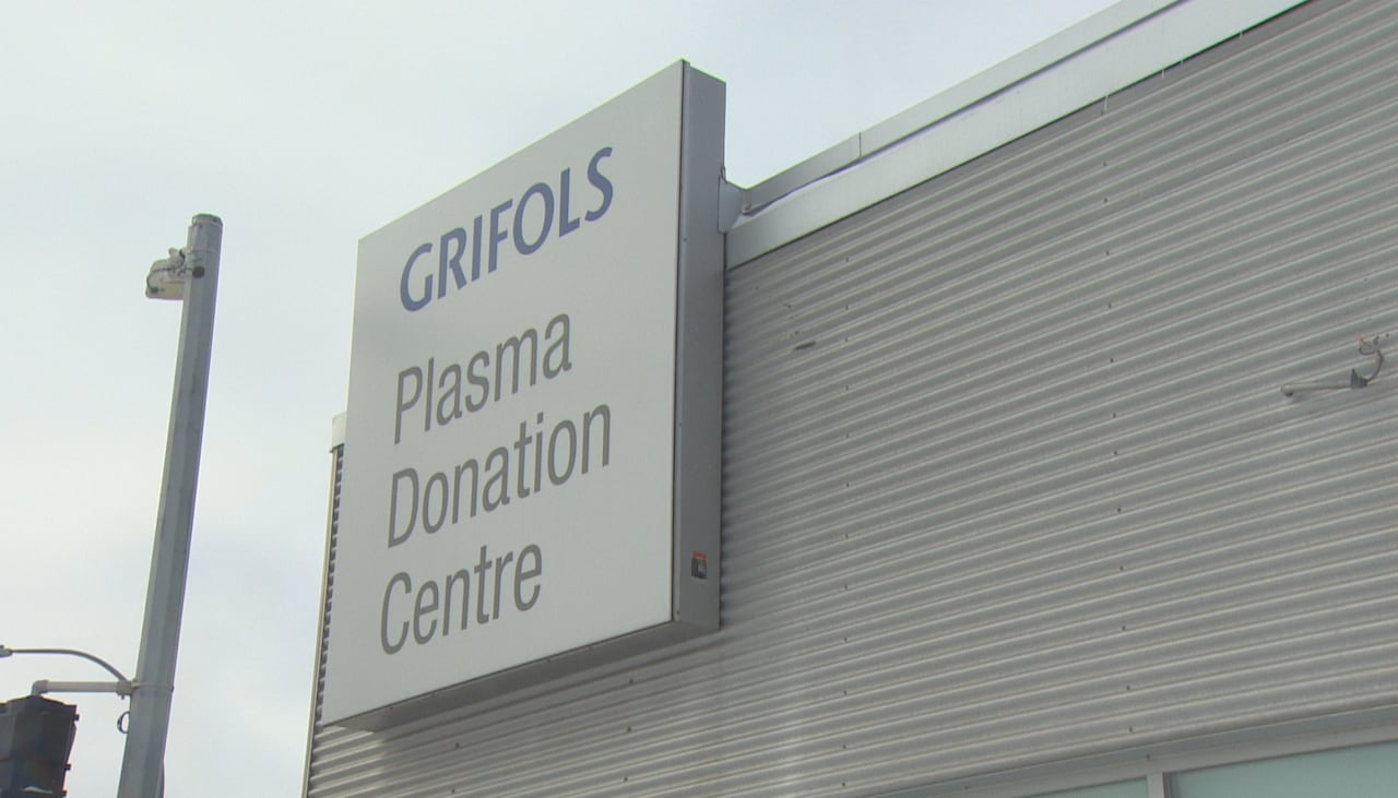 A building that says "GRIFOLS: PLASMA DONATION CENTRE"