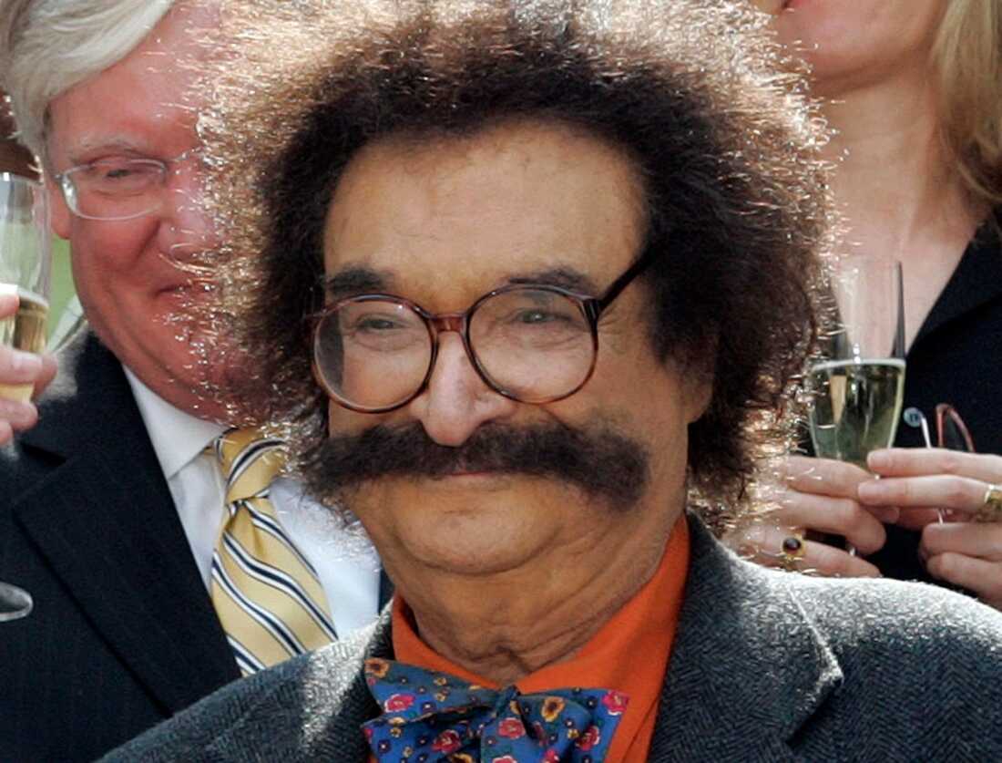Film critic Gene Shalit is seen during a toast with Today show cast and crew at the end of Katie Couric's final show on May 31, 2006, in New York.