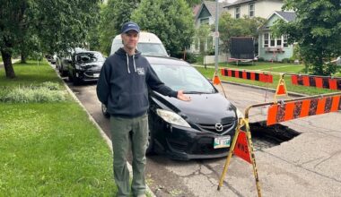 What a way to wake up! Winnipeg man finds his car slumped in sinkhole