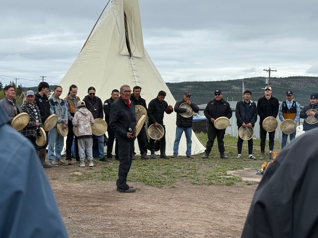 Junie Catholique gave opening remarks and led a feeding the fire ceremony with the community, dignitaries and guests at the Thaıdene Nëné Badı Xá celebration in Łutsel K’é on June 10.